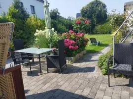 Fewo "Am Deich" 70m zum Strand, Glasfaser, Fahrradgarage, eigener Parkplatz, eigener Garten