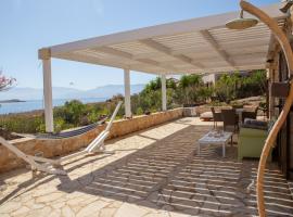 Villa Romanza beach villa, hôtel avec parking à Hálki