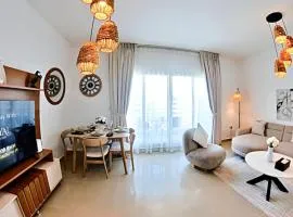 Roxen Retreat 1BR - Comfortable Poolside Living Near Al Reef Beach