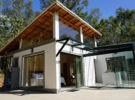 Beautiful glass house with a view and lush water