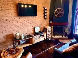 Boutique Flat com Banheira Lareira e Piscina Aquecida