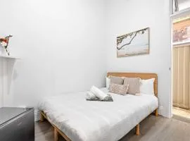 No Frill Economic Double Room - Ideally Located - Shared External Bathroom & Kitchen