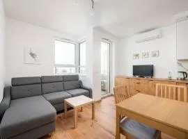 Metro Natolin 10th Floor Apartment by BookingHost