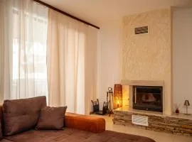 Holiday home with indoor fireplace
