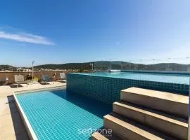 Estadia com piscina e sauna a poucos passos da praia em Cabo Frio - HSC