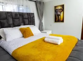 M&M SIGNATURE GUEST HOUSE 5 BEDDED SLEEPS 8 in RUWA HARARE LUXURIOUS AMENITIES DECO AND MORDEN GAZEBO SOLAR GAS GEYSER WIFI BOREHOLE DURAWALLED GATED SECURITY CAR PARK STAFF LAUNDRY CATERING PURE COMFORT 25MINS FROM CBD &AIRPORT