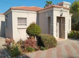 Chic and Secure Phakalane Stay