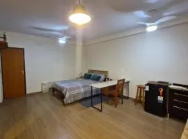 Suíte Aconchegante, bem localizada