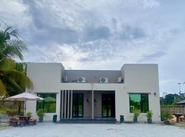 NitaDinn Guest House, villa in Kampong Ru Sepuloh