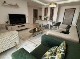 Élégant appartement avec parking privé proche aéroport et centre ville Tunis Laouina, apartamento en El Aouina