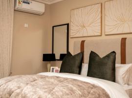 RJV Apartments, Meanwood Ibex Hill, Lusaka, hotel con estacionamiento en Lusaka
