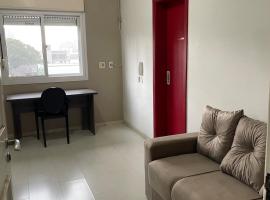 JK prox Regina e Feevale com AC e espaço Home Office, hotel in Novo Hamburgo