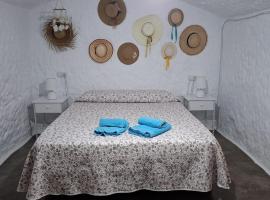 Cueva la Tita del Pan, hotel i Bácor