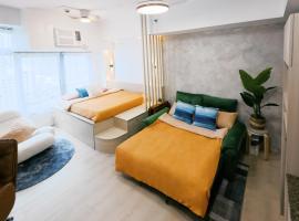 Breathtaking Eastwood City View, 3min walk to Malls, with Washer، فندق في مانيلا