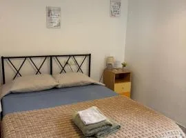 Habitación con baño compartido