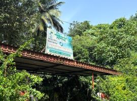 hotel nisarg, timebasishotel i Māhīm