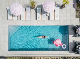 West Nieuwlandseweg 25A - Ouddorp - Poolvilla Zilt & Zoet, hotel v mestu Ouddorp