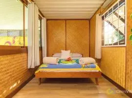 Room 1 - Secluded Rustic Bungalow by Tipaniers Beach