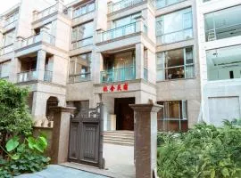 Golden Peach Riverside Manor