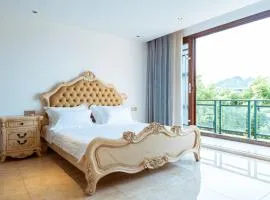 Golden Peach Riverside Manor