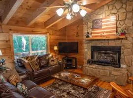 Updated Cabin with 2 primary suites, hot tub, spacious covered porch