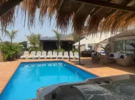VILLA BLOSSOM in the beautiful area of Puerto Santiago Tenerife with 5 bedrooms for up to 10 guests private swimming pool and many other activities to entertain the family Secure parking for 2 cars and disabled access throughout