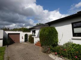 fewo1846 - Haus Hygge - Bungalow mit Garten und 2 Schlafzimmern โรงแรมในเฟลนส์บวร์ก