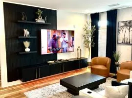 Free Parking, King Bed, 75 inch TV, and Luxury Stay