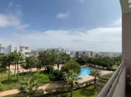 Appartement cosy à Imi Ouaddar, vue sur piscine à 5 minutes de la plage
