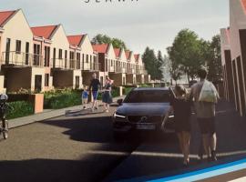 Biała Fala apartamenty nad jeziorem, hotel in Sława