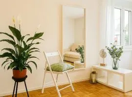 Bright newly furnished apartment with workspace and garden area near Zurich