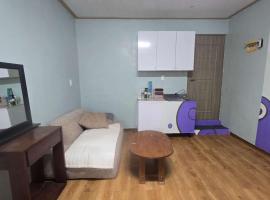 Blue Beach House INN, hotel in Garapan
