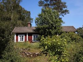 Vuohensaari Camping Ahtela's cottage, cabaña o casa de campo en Salo