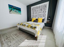 Appt super luxe 3 chambres Pointe aux Canonniers، فندق في بوانت أو كانونيرس