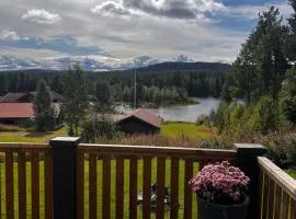 Hildas Hus with river view and spa