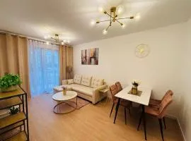 Lotus Apartments Impero oddzielna kuchnia 2 pokoje garaż