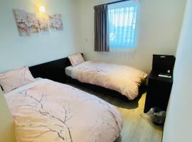 Omori Happy Smile Hotel, hotel Vadában