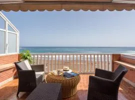 Apartment with Terrace on the Beachfront.