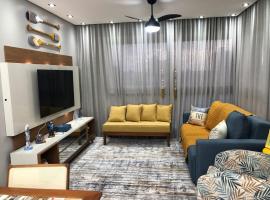 LINDO Apartamento no CENTRO de TRAMANDAI com PISCINA aquecida, ξενοδοχείο σε Tramandai