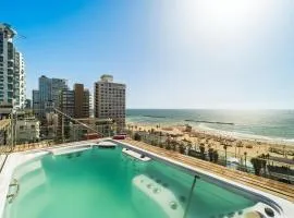 Grand 3BR Beachfront Apartment