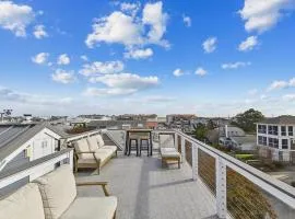 Beach House with Rooftop Deck by Leavetown Vacations