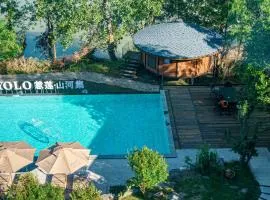 Zhangjiajie YOLO RELIAN Mt and River Collection-Riverside hotel with sunrise,sunset views, ticket service for attractions, afternoon tea,coffee, and laundry service