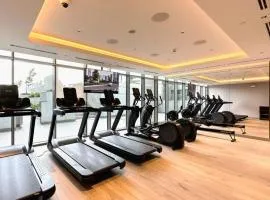 Elegant 1BR Plus Guest Study Room at SOBHA Waves - Luxury Stay