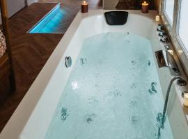 La Parenthèse Fleurie - Suite avec balnéo au coeur de Bergerac, hotel in Bergerac