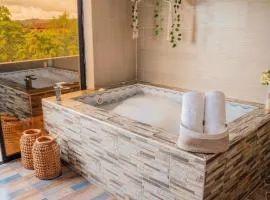 Cabañas con jacuzzi y chimenea - Casa Floral, Marinilla