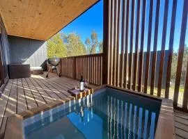 Cabaña en el bosque con tinaja privada