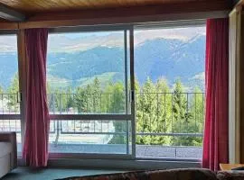 Appartamento panoramico con vista sulle montagne e accesso diretto alle piste