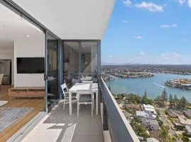2BR Coastal Luxe Views Pool Parking WiFi Gym