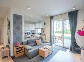 Beautiful apartment with garden and private garage, close to the airport