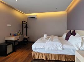 Q3 Inn, ξενοδοχείο με υδρομασάζ σε Semporna